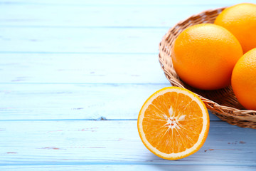 Ripe orange fruit on a blue background