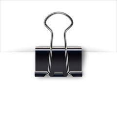 Binder clip for paper design. Realistic metallic black paper clip with shadow from a sheet of paper.