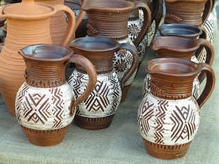 Handmade ceramic clay brown pottery, souvenirs at handicraft market