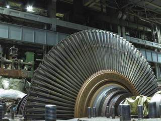 Disassembled steam turbine in the process of generator repair at power plant