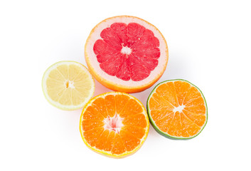 Fototapeta na wymiar Halves of some various citrus on a white background