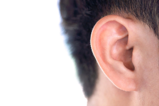 Close up man's ear on white background