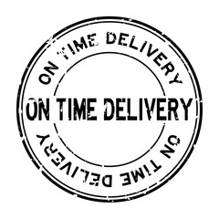 Grunge black on time delivery word round rubber seal stamp on white background