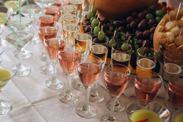 Obraz na płótnie Canvas Exotic alcoholic cocktails. Fruit on the table 