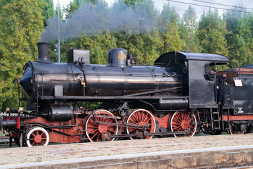 Fototapeta na wymiar treno d'epoca a vapore, vintage steam train