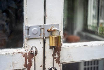 close up metal lock with door