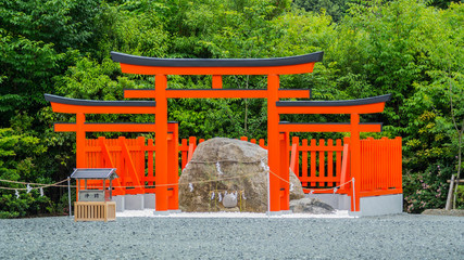 Fototapeta na wymiar Japanese traditional Torii and Holy Stone 