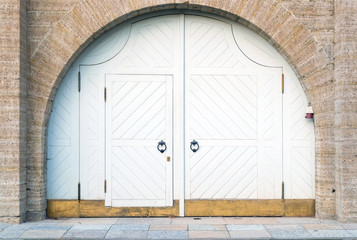 Heavy wooden gate in an ancient palace