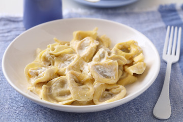 Ravioli under cream sauce