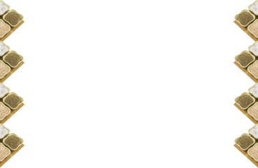 two parallel vertical curb set seasoning coriander ground garlic salt base on a wooden tray culinary design on a white background