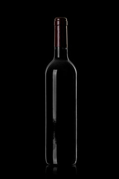 dusty bottle with red wine