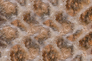 brown texture stone foundation with cement lines diagonal geometric pattern background urban