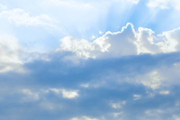 bright colorful background azure sky with white clouds in sunlight base light airy