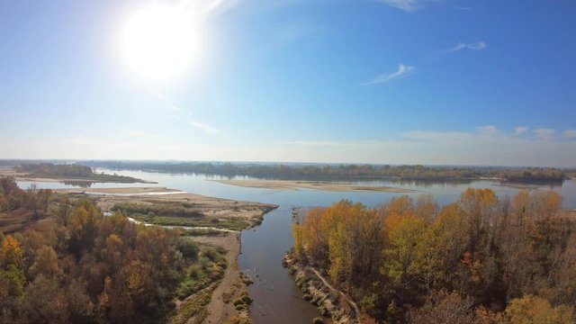 Vistula River and Its Tributary Świder Near Warsaw, Mazovian Voivodeship, Poland. Autumn Day. The Drone Is Flying Down.
