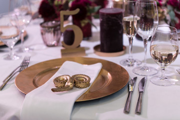elegant purple, gold and white table setting