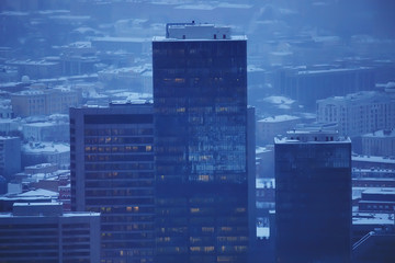 landscape skyscrapers night / business center in a night landscape, winter lights in the windows of houses in the business district