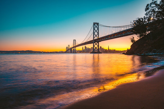 San Francisco skyline with Oakland Bay Bridge at twilight, California, USA