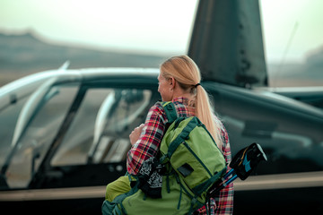 Woman Taking A Helicopter Hiking Tour In The Remote Deserts Of The Utah Canyonlands
