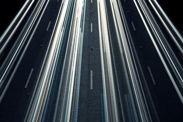 Dark Blue Light Streaks On Multiple Lane Highway
