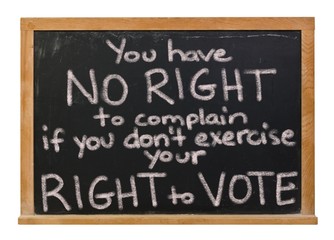 Obraz premium You have no right to complain if you don't exercise your right to vote written in white chalk on a black chalkboard isolated on white