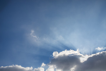 Beautiful blue sky with clouds and sun rays
