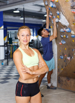 Female instructor near climbing wall