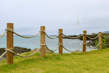 Obraz premium Windmills in a sea in south korea on jeju island