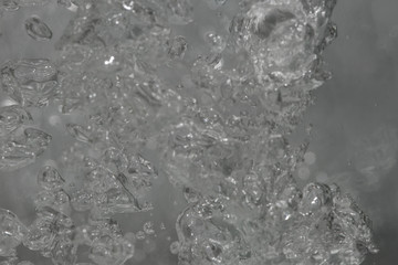 Close-up air bubbles in the water background,Large amount of air bubbles in water isolated  background