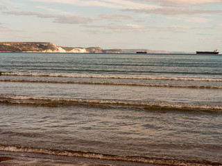 Weymouth beach dorset waves ocean water cliff tops white landscape open space beach