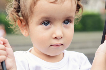 Beautiful baby girl in the park