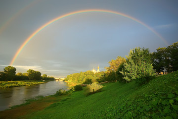 Fototapeta na wymiar summer landscape with a rainbow