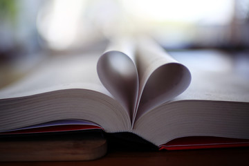 heart from pages of the book concept love tea coffee