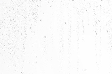white isolated background water drops on the glass / wet window glass with splashes and drops of water and lime, texture autumn background - obrazy, fototapety, plakaty