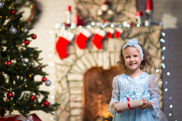 Baby girl in christmas interior