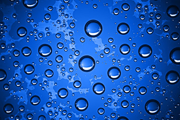 fresh drops background blue glass / wet rainy background, water drops transparent glass blue