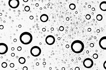 white isolated background water drops on the glass / wet window glass with splashes and drops of water and lime, texture autumn background