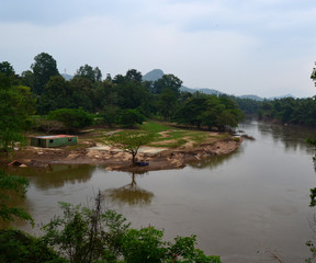 River Kwai train crossing the Wampoo Viaduct on the Death Railway above the River Kwai valley near Nam Tok, Kanchanaburi