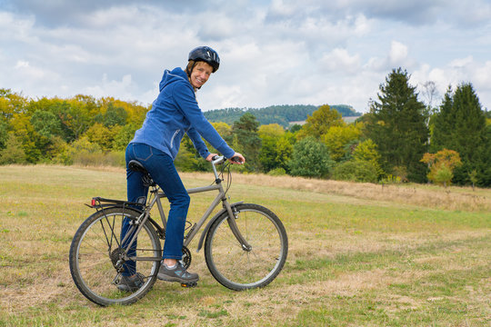 Dutch woman on mountain bike in nature