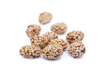 Coated peanuts with sesame isolated on white background