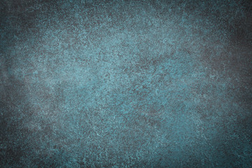 Dark green slate background. Stone or concrete surface