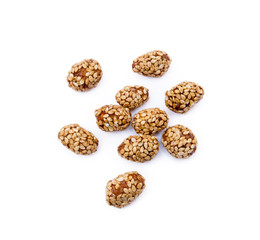 Coated peanuts with sesame isolated on white background