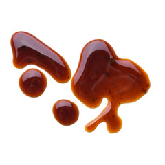 Puddle of tasty soy sauce isolated on a white background
