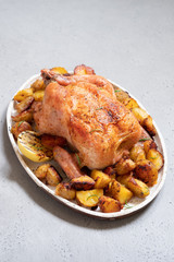 Whole roasted chicken with potato