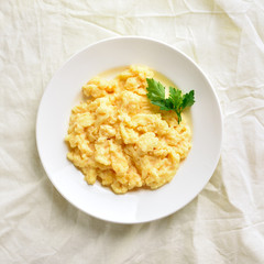 Plate with scrambled eggs