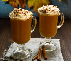  Pumpkin latte with whipped cream and cinnamon