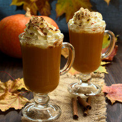  Pumpkin latte with whipped cream and cinnamon