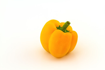 Colorful of fresh yellow sweet bell pepper (capsicum)   stack on white  background