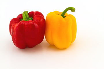 Colorful of fresh red and yellow sweet bell pepper (capsicum)   stack on white  background