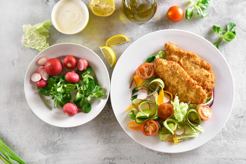 Vegetable salad and schnitzel