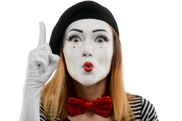 Woman points finger up